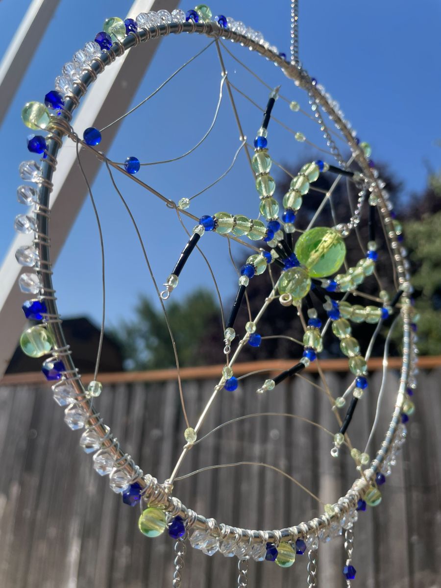 Handmade Spider on Web Sun Catcher, Uranium Glass with Blue Accents - Image 3